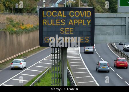 Cardiff, Wales, UK. 19/10/2020. Traffic travelling south into Cardiff on the A470 are reminded of restrictions in place because of Covid 19. First Min Stock Photo