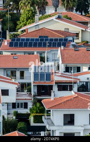 Solar panels on a house roofs Stock Photo