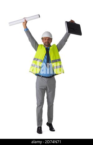 Male engeneer architect foreman in white hardhat and safety vest winner with raised arms isolated on white background full length studio portrait Stock Photo