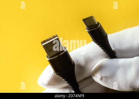 USB cable from USB to USB 3.1 type C. abstract yellow background for ad design Stock Photo