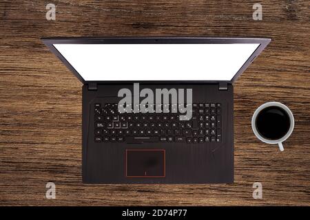 Black laptop over a table. Notebook with empty screen. blank copy space on modern mobile computer. Stock Photo