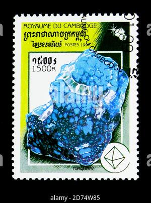 MOSCOW, RUSSIA - NOVEMBER 24, 2017: A stamp printed in Cambodia shows Turquoise, Minerals serie, circa 1998 Stock Photo