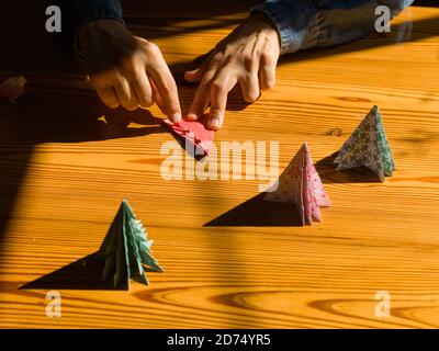 Creating christmas gifts decorations with christmas trees. Made with y Stock Photo