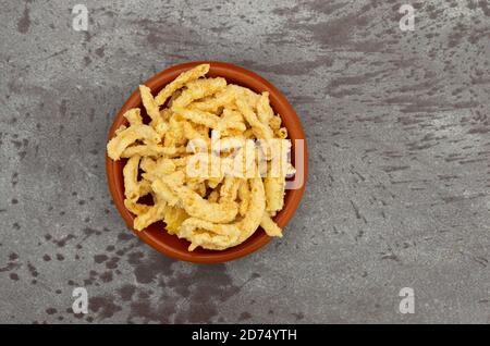 French fries and fast food takeaway in menu during pandemic. Fried potatoes  in ecological paper packaging with shadow Stock Photo - Alamy