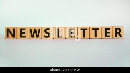 'Newsletter' written on wood blocks. Business concept. Copy space. Beautiful white background. Stock Photo