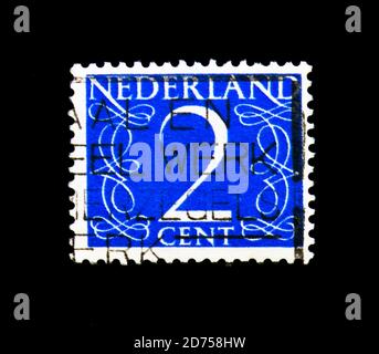 MOSCOW, RUSSIA - NOVEMBER 25, 2017: A stamp printed in Netherlands shows Numeral, Numbers serie, circa 1946 Stock Photo