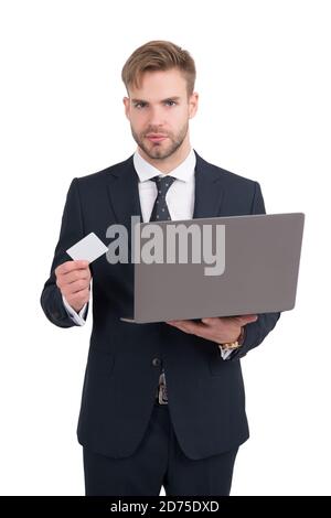 Businessman in formal style hold laptop computer and identity card for copy space, identification. Stock Photo