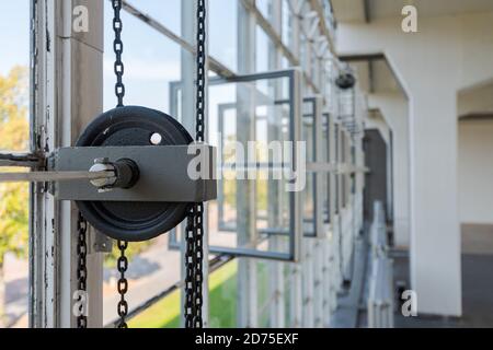 Chain pull for opening and closing big windows in the Bauhaus Dessau Stock Photo