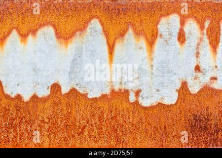 Beautiful orange rust pattern on a galvanised steel metal surface Stock Photo