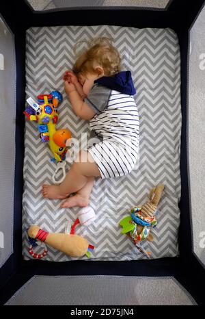 A one year boy in a crib Stock Photo - Alamy