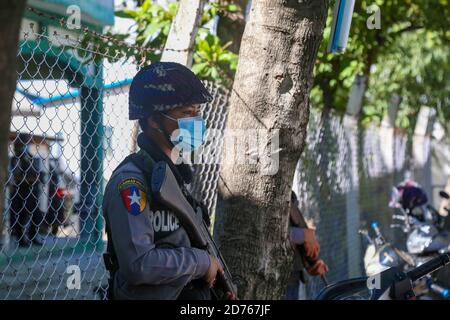 Mandalay, Myanmar. 20th Oct, 2020. Police standing on guard in front of the court.The United Democratic party chairman, U Kyaw Myint who was arrested for absconding, was arraigned for the third time in Chan Aye Thar Zan Township Court. Credit: SOPA Images Limited/Alamy Live News Stock Photo