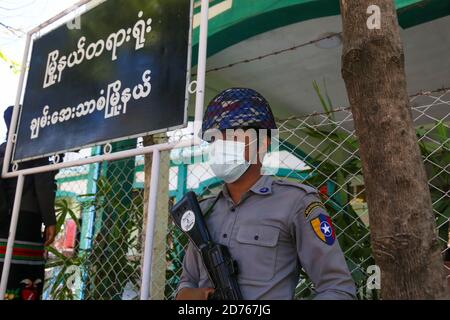 Mandalay, Myanmar. 20th Oct, 2020. Police standing on guard in front of the court.The United Democratic party chairman, U Kyaw Myint who was arrested for absconding, was arraigned for the third time in Chan Aye Thar Zan Township Court. Credit: SOPA Images Limited/Alamy Live News Stock Photo