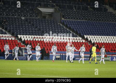 layers of Manchester United enter the pitch in front of empty stands before the UEFA Champions League, Group Stage, Group H football match between Pa Stock Photo