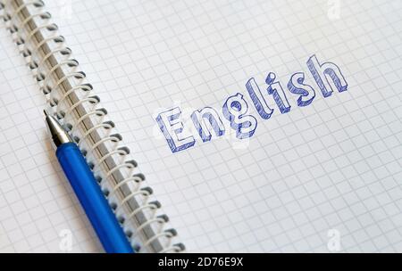 Lettering English on sheet of notebook Stock Photo