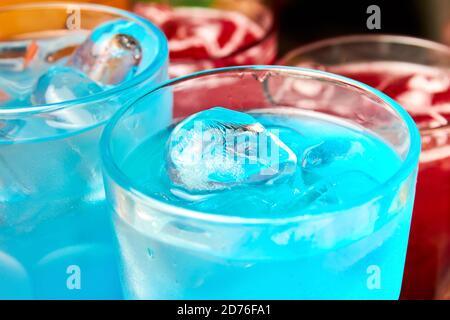 Multicolored alcoholic and non-alcoholic cocktails with ice Stock Photo