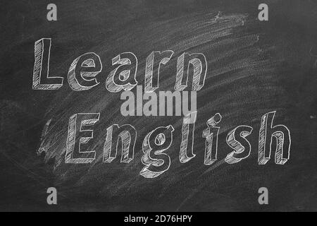 Hand drawing 'Learn English' on blackboard Stock Photo