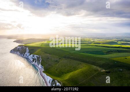 Aerial view wtih beautiful, UK England Europe Dorset Durdle Door Beach white cliff sunset Stock Photo