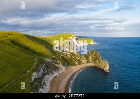 Aerial view wtih beautiful, UK England Europe Dorset Durdle Door Beach white cliff sunset Stock Photo