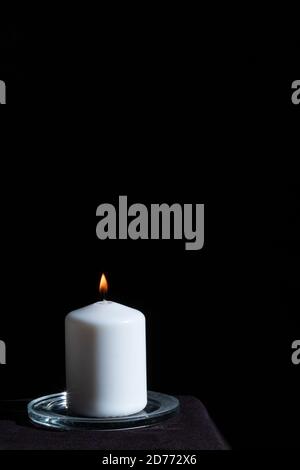 candle burning  in the dark, halloween or prediction concept Stock Photo