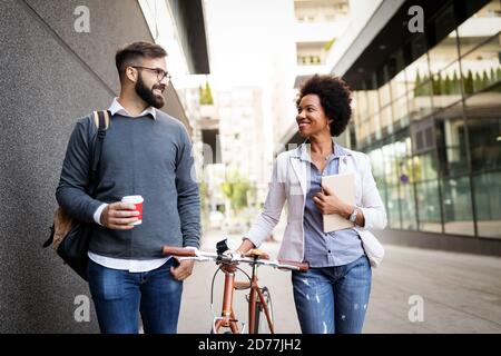 Business people on coffee break using digital tablet outdoor Stock Photo