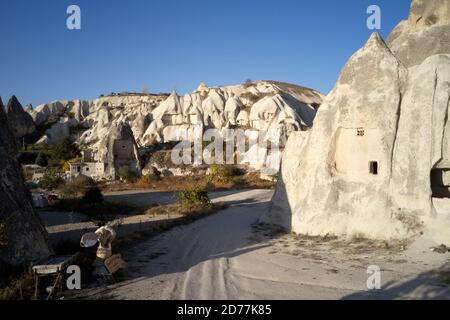 Cave dwellings at the valley of Uchisar town. Stock Photo