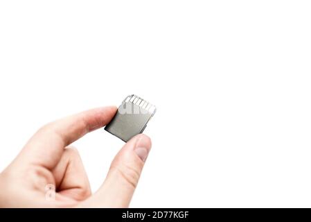 sd card in hand isolated on white background. information concept Stock Photo