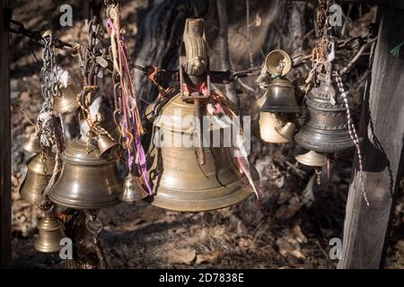 Nepal. Front view of Hindu bells at door of Muktinath temple. Annapurna Circuit. Stock Photo