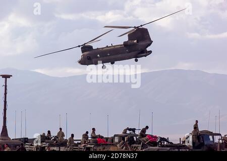 U.S. Army Boeing CH-47 Chinook departs a landing zone after unloading soldiers Paktika Province in Sharana, Afghanistan, 11, November, 2002. Amel Emri Stock Photo