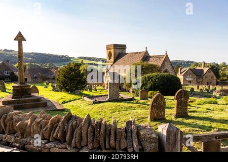 Evening light on St Barnabas church in the Cotswold village of Snowshill, Gloucestershire UK