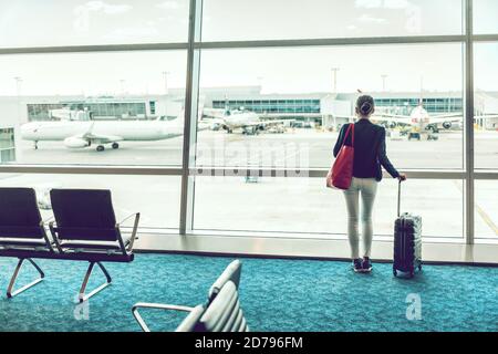 Traveler businesswoman waiting at airport lounge Stock Photo