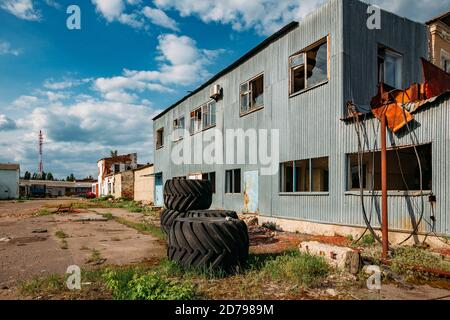 Territory of abandoned industrial area waiting for demolition or reconstruction Stock Photo