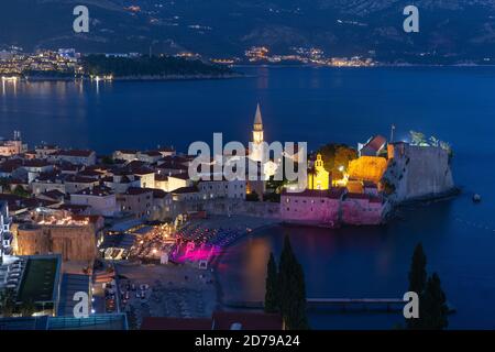 Aerial night view of Saint Ivan and Holy Trinity churches in Old Town of Montenegrin town Budva on the Adriatic Sea, Montenegro Stock Photo