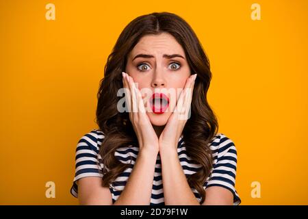 Close-up portrait of her she nice attractive lovely glamorous miserable sad wavy-haired girl bad news disappointment isolated on bright vivid shine Stock Photo