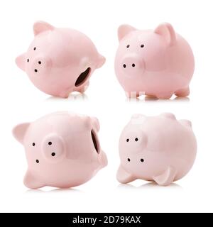 Set of pink ceramic piggy banks isolated on white background