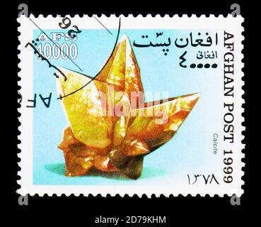 MOSCOW, RUSSIA - DECEMBER 21, 2017: A stamp printed in Afghanistan shows Calcite, Minerals serie, circa 1999 Stock Photo