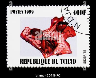 MOSCOW, RUSSIA - DECEMBER 21, 2017: A stamp printed in Chad shows Siderite, Minerals serie, circa 2000 Stock Photo