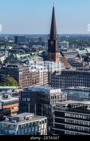 View east from St. Nikolai Memorial in Hamburg, showing St. Jacobi Church, simpler shaped steeple. Stock Photo