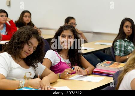 Students listen to teacher during class at Achieve Early College High School on the campus of South Texas College. The school, part of the highly regarded McAllen school district in South Texas on the US-Mexico border, enrolls nearly 500 students, almost 3/4 of whom come from economically disadvantaged families. Stock Photo