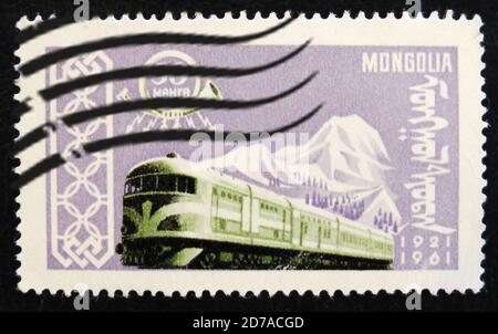 MOSCOW, RUSSIA - APRIL 2, 2017: A post stamp printed in Mongolia shows electric train, circa 1961 Stock Photo