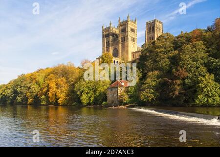 The landmark Durham Cathedral stands high above the River Wear in the city of Durham in the north east of England. Captured in autumn. Stock Photo
