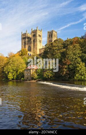 The landmark Durham Cathedral stands high above the River Wear in the city of Durham in the north east of England. Captured in autumn. Stock Photo