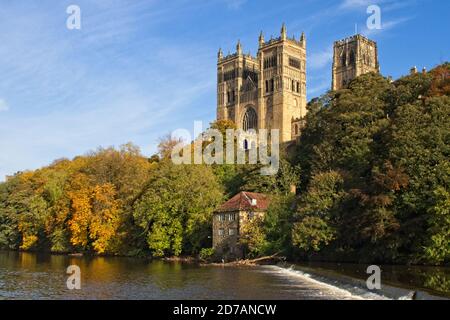 The landmark Durham Cathedral stands high above the River Wear in the city of Durham in the north east of England. Captured in autumn. Stock Photo