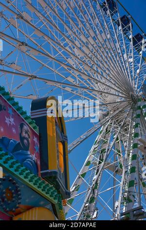 A ferris wheel with a 1950s rock and roll themed ferris wheel bearing ...