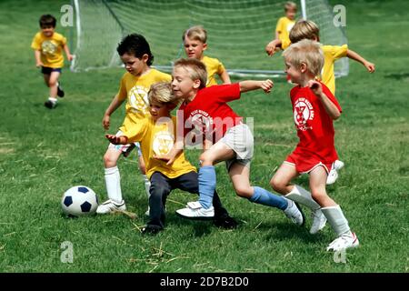 soccer action with boys ages 6 - 9 years of age Stock Photo
