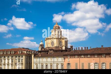TURIN, ITALY - CIRCA AUGUST 2020: perspective on the elegant and Baroque Saint Lawrence church in Turin. Amazing natural light with a blue sky. Stock Photo