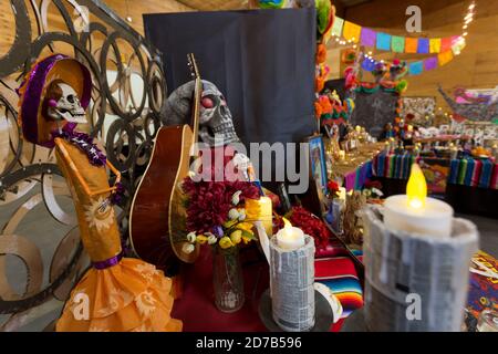 The community altar is prepared for the Dia de los Muertos Community Celebration by artist Rosie Salndaña in Tieton, Washington on Saturday, October 17, 2020. Tieton Arts & Humanities hosts the annual celebration to remember friends and family members who have died and to help support their spiritual journey. Stock Photo