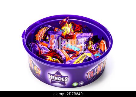 Tub of Cadbury Heroes with miniature bars of chocolate including Wispa,Fudge,Dairy Milk,crunchie bits,Creme egg,Caramel Stock Photo