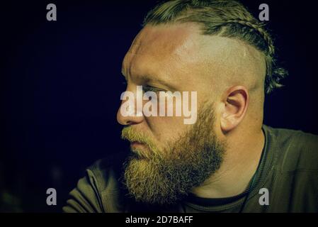 Hipster style bearded man. the attractive man the blonde with long hair of the European appearance with a beard Stock Photo