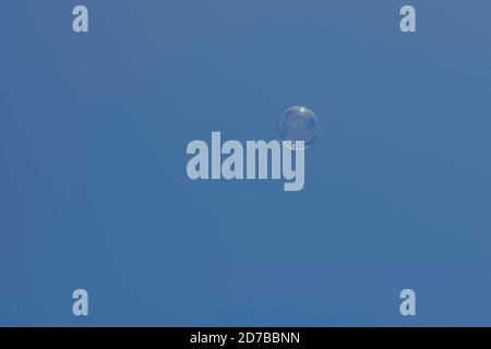 Soap bubbles floating in the sky Stock Photo