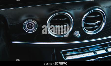 start button engine and car ventilation grille air conditioning Stock Photo